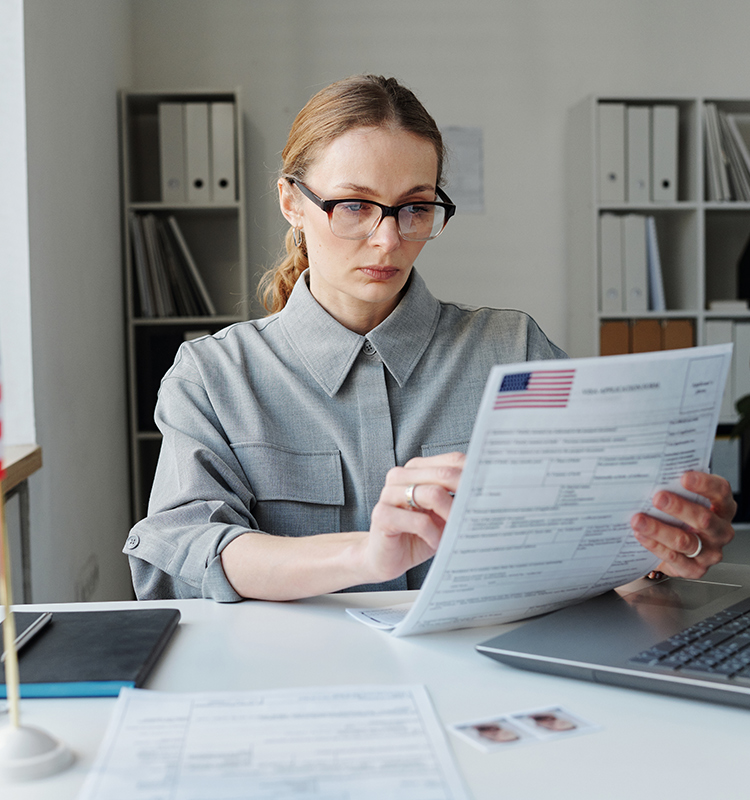 woman working with papers in embassy f5w47r7.jpg
